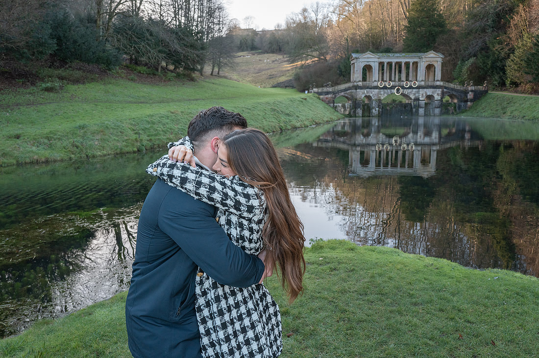 “Surprise proposal at Palladian Bridge in Bath with champagne celebration”