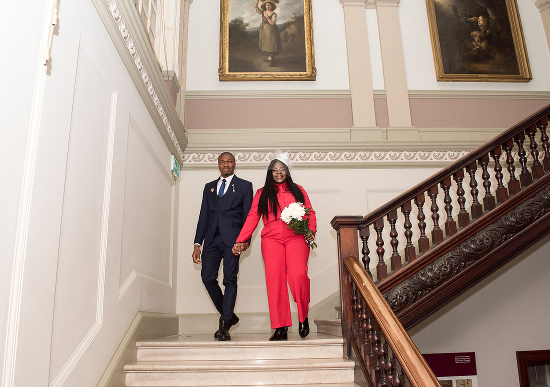 couple walking together on the wedding day, bath guildhall
